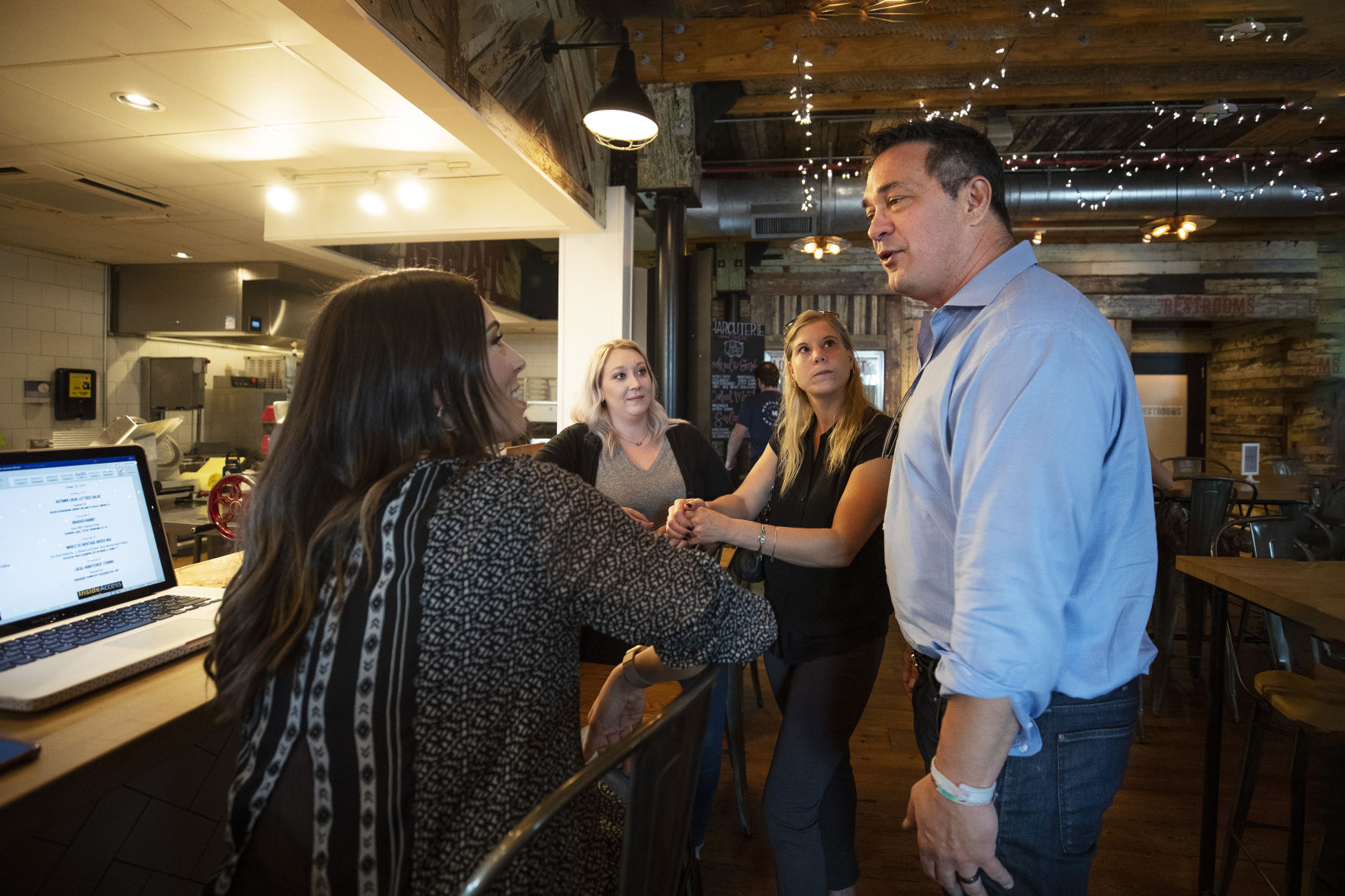 Steve Palmer with patrons.jpg